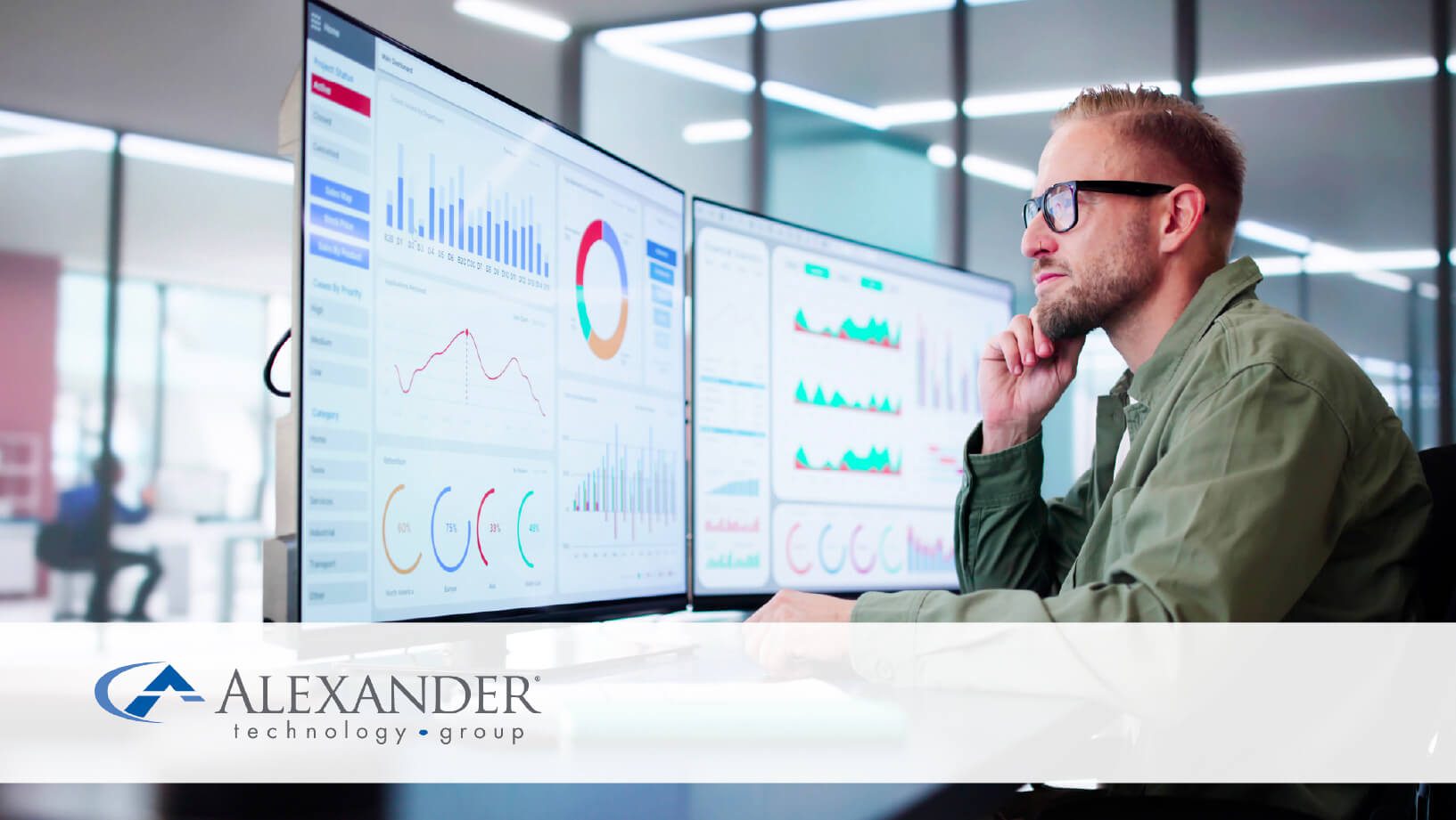 Man at desk looking at monitor